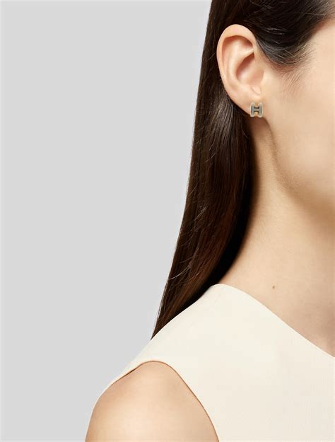 stud hermes earrings|hermes horn and lacquer earrings.